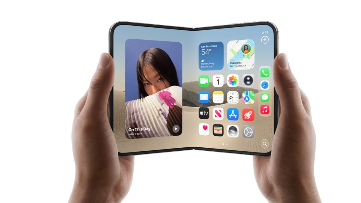 Apple's iPhone Duo held open in two hands, showing its inner display