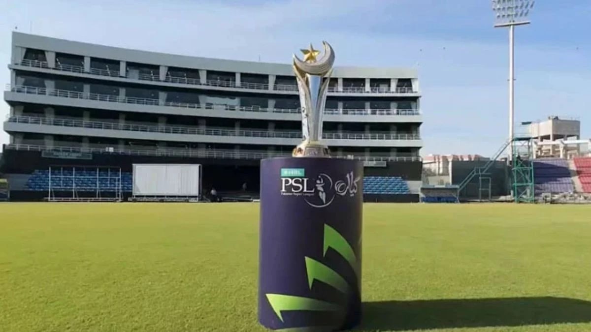 The Pakistan Super League trophy on a PSL-branded stand at a cricket stadium