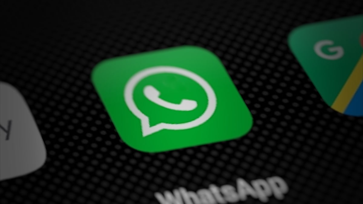 Close-up of the WhatsApp app icon on a phone screen